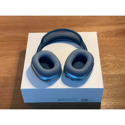 AirPods Max over-ear headphones with ANC and spatial audio.